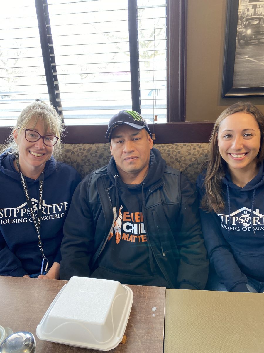 Former SHOW resident Cisco having lunch with Leigh-Ann (Donor Engagement Coordinator) and Nicole (Program Manager) and chatting about his new home, volunteering, and success.